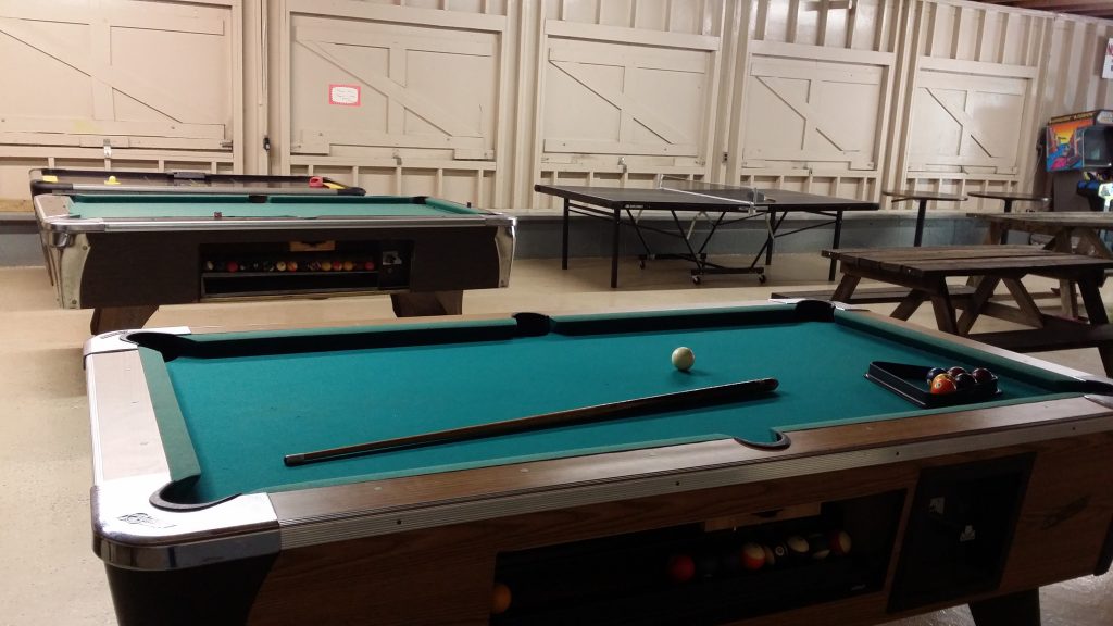 Beach rec hall pool tables