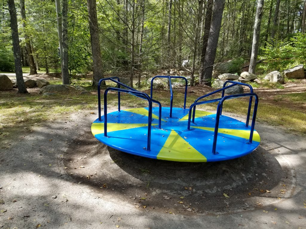 playground spinner near Brown Bathhouse