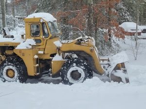 winter message 2021 loader clearing snow